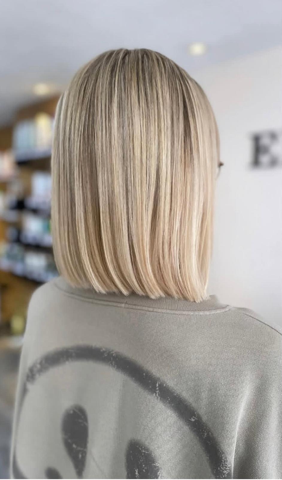 Blonde Balayage mit weichen Wellen